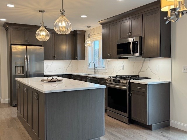 795 Leominster Road Lunenburg, MA 01462 - Photo 8 of 33 a kitchen with stainless steel appliances stove and microwave