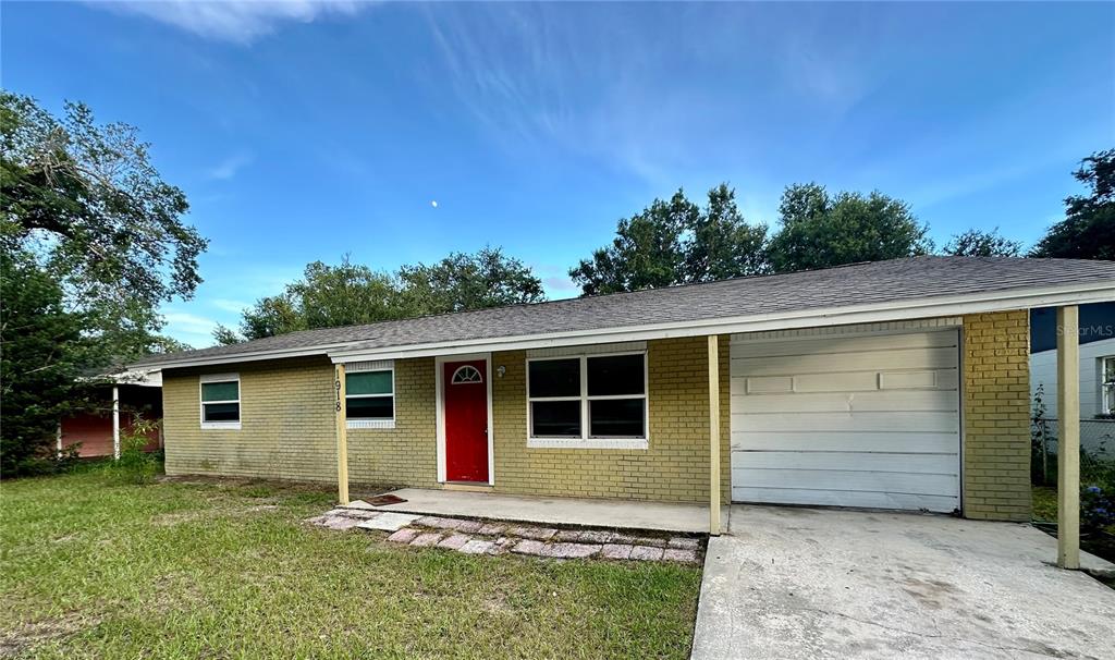 front view of a house with a yard