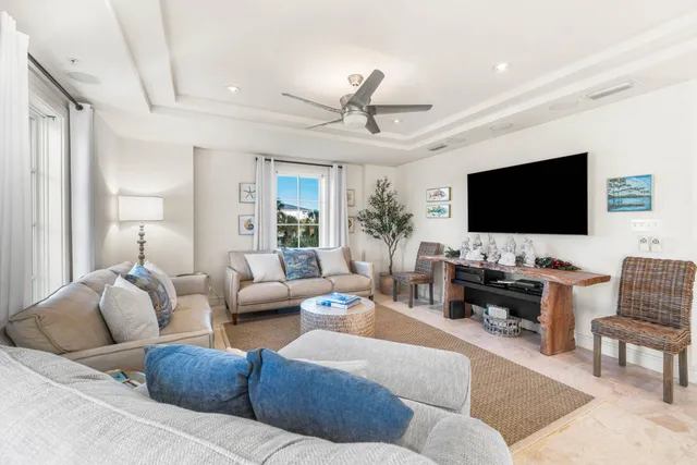 a large kitchen with a table and chairs
