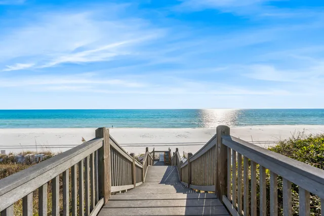 a view of a balcony with an ocean view