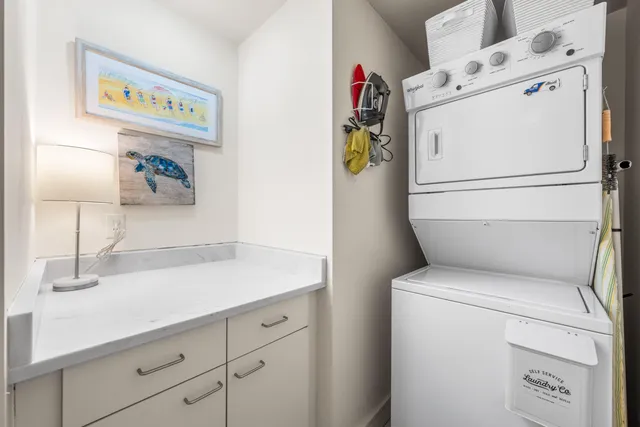 a view of a chairs and table in patio