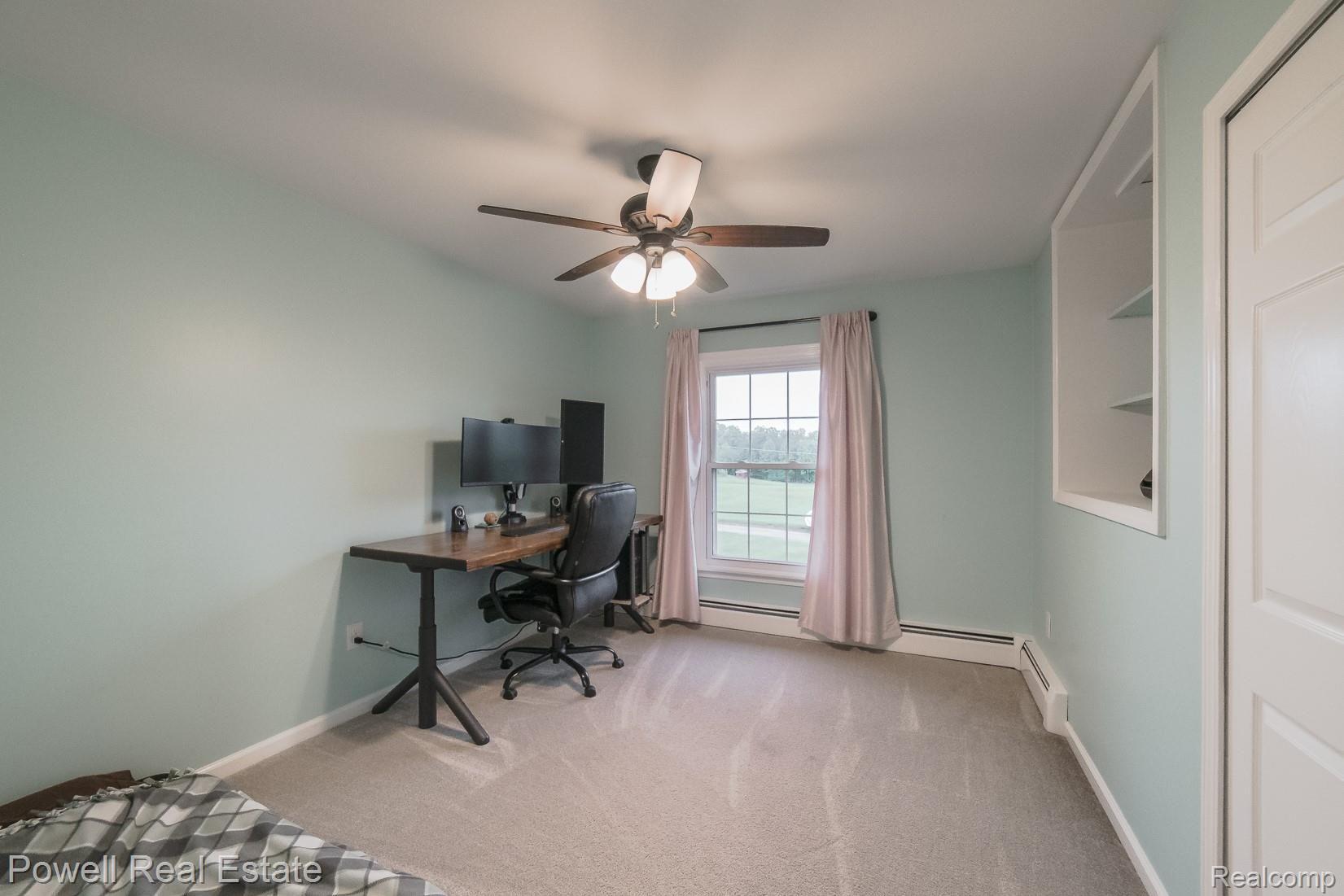 100 Gilmour Road Leonard, MI 48367 - Photo 14 of 29 GREAT WINDOW, THIS BEDROOM BOASTS A CLOSET AND BUILT IN AREA!