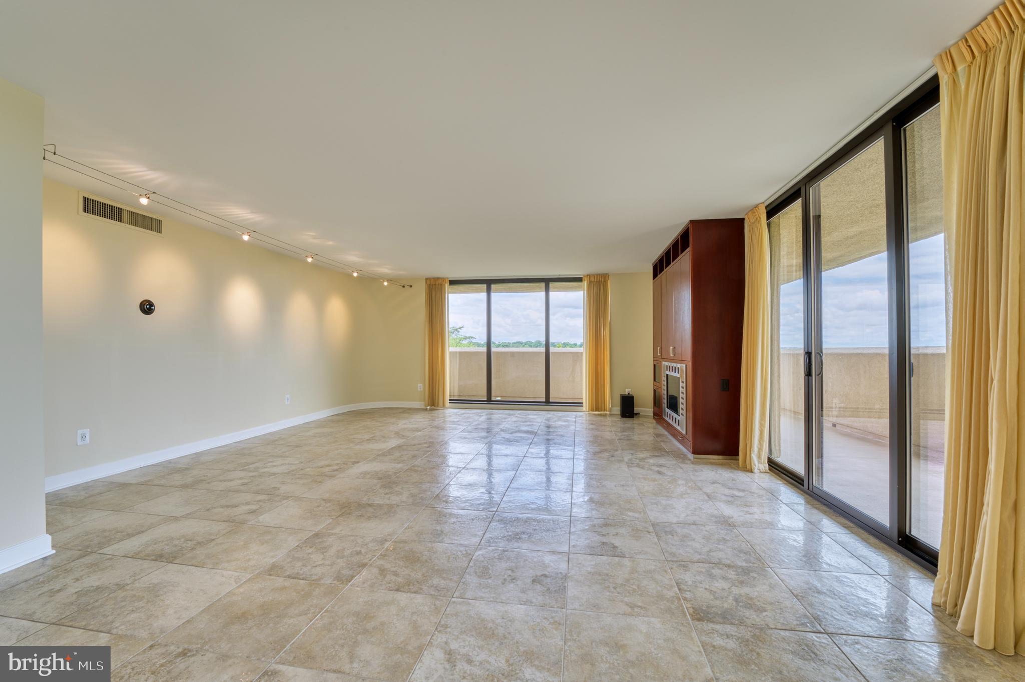 1101 South Arlington Ridge Road, Unit 616 Arlington, VA 22202 - Photo 18 of 57 New Floor to Ceiling Sliding glass doors