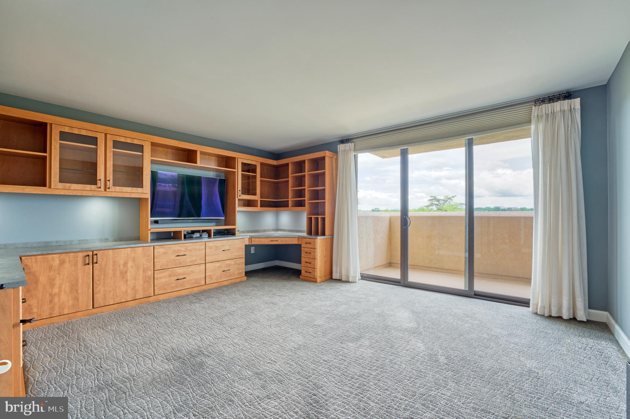 1101 South Arlington Ridge Road, Unit 616 Arlington, VA 22202 - Photo 50 of 57 3rd Bedroom w/ Built in office system and balcony