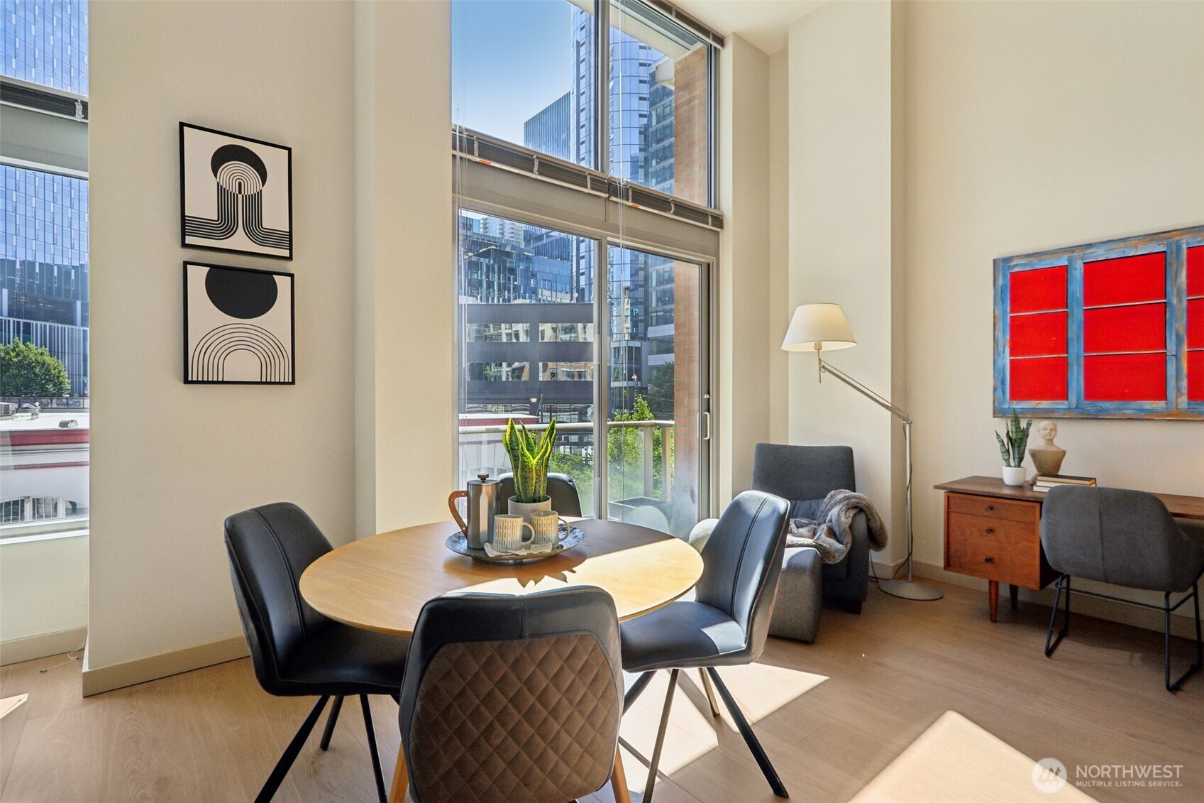 900 Lenora Street, Unit W106 Seattle, WA 98121 - Photo 11 of 40 a work room with furniture and a window