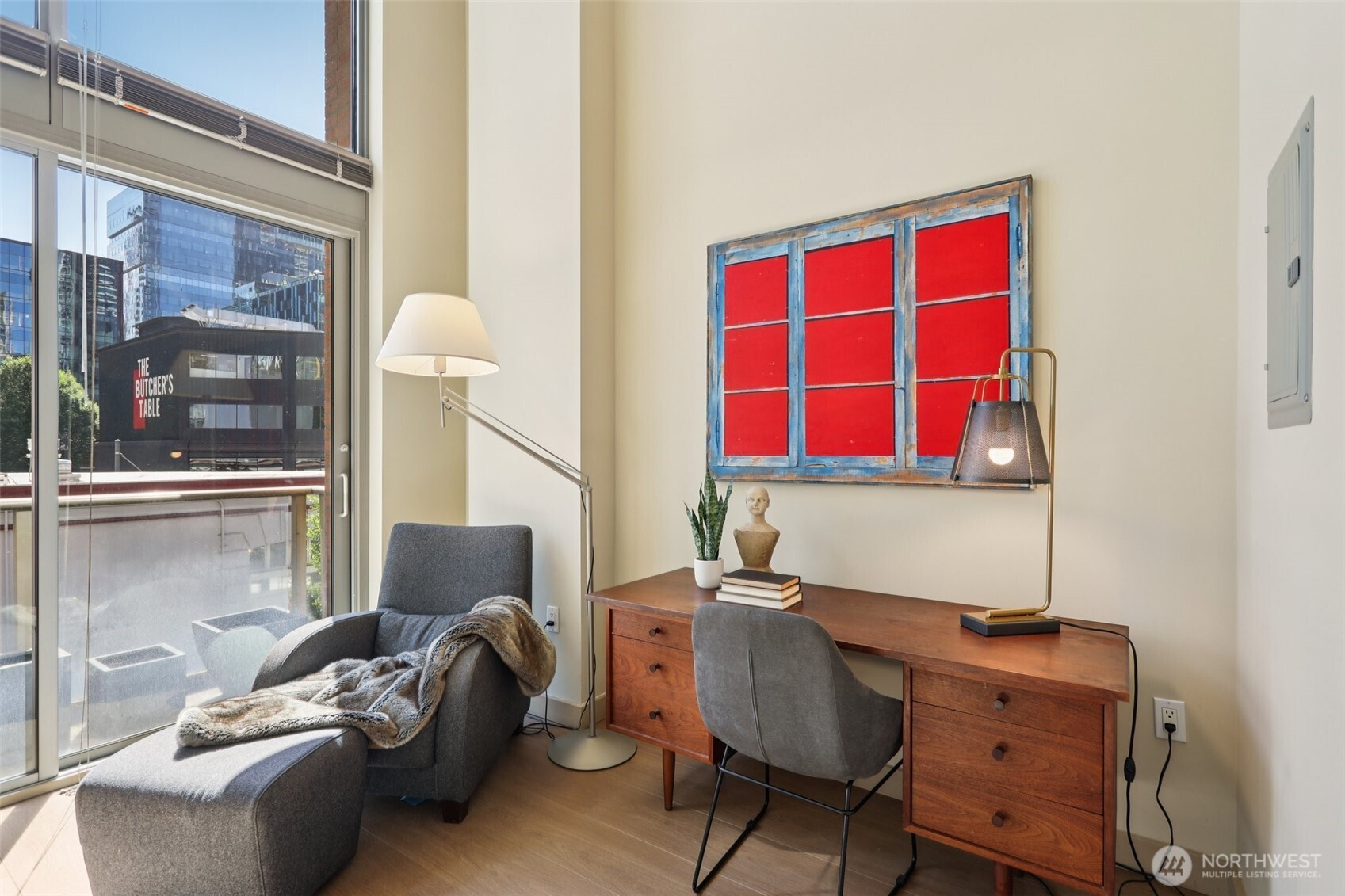 900 Lenora Street, Unit W106 Seattle, WA 98121 - Photo 13 of 40 a living room with furniture and a window