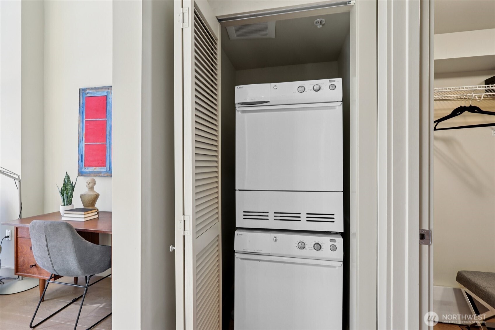 900 Lenora Street, Unit W106 Seattle, WA 98121 - Photo 17 of 40 a utility room with dryer and washer
