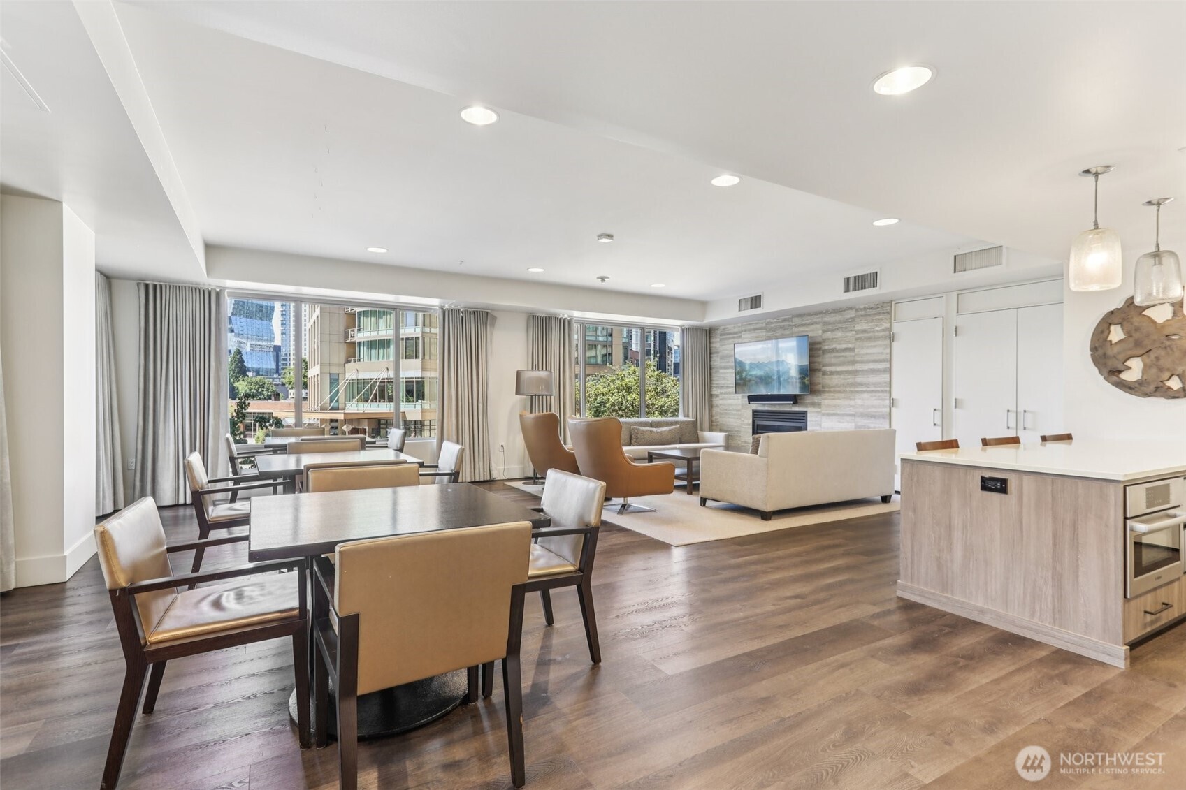 900 Lenora Street, Unit W106 Seattle, WA 98121 - Photo 25 of 40 a living room with furniture and a table