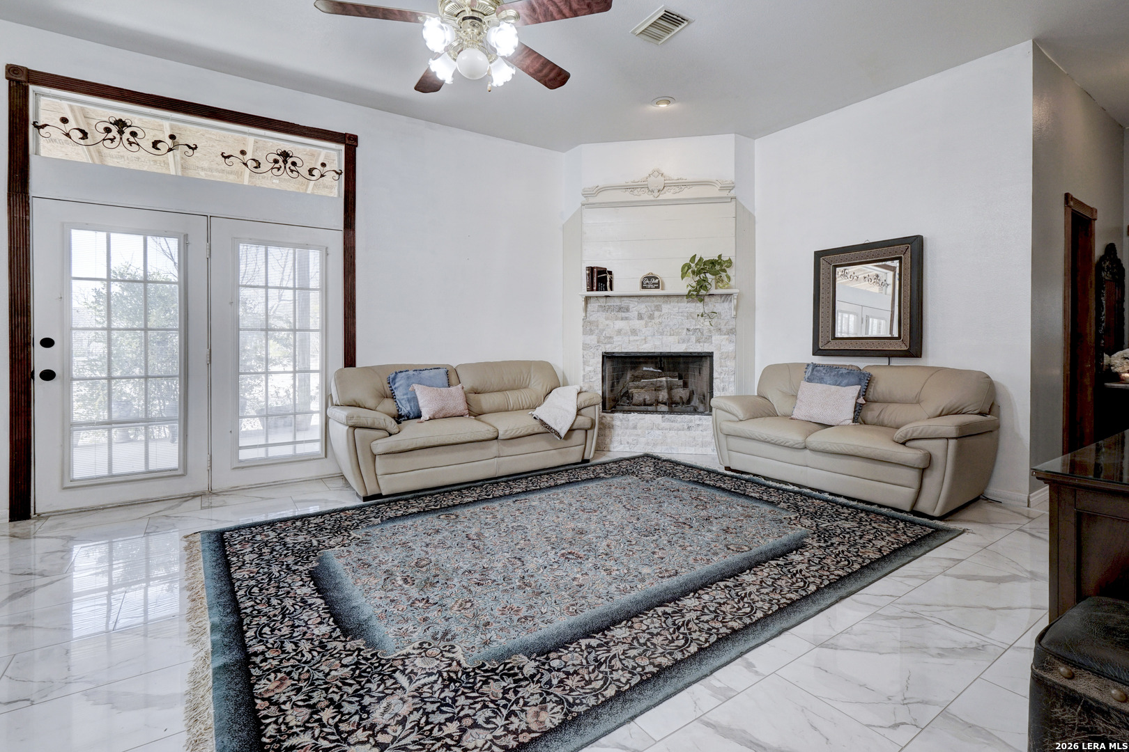 309 South Rolling Oaks Lane San Antonio, TX 78253 - Photo 13 of 43 a living room with furniture and a fireplace