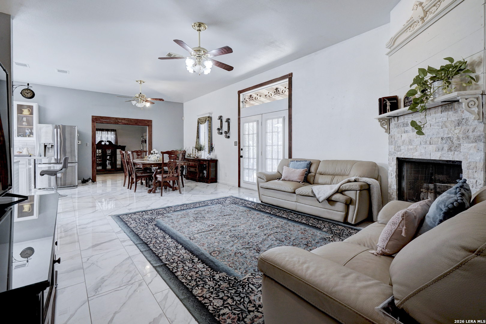 309 South Rolling Oaks Lane San Antonio, TX 78253 - Photo 15 of 43 a living room with furniture and a fireplace