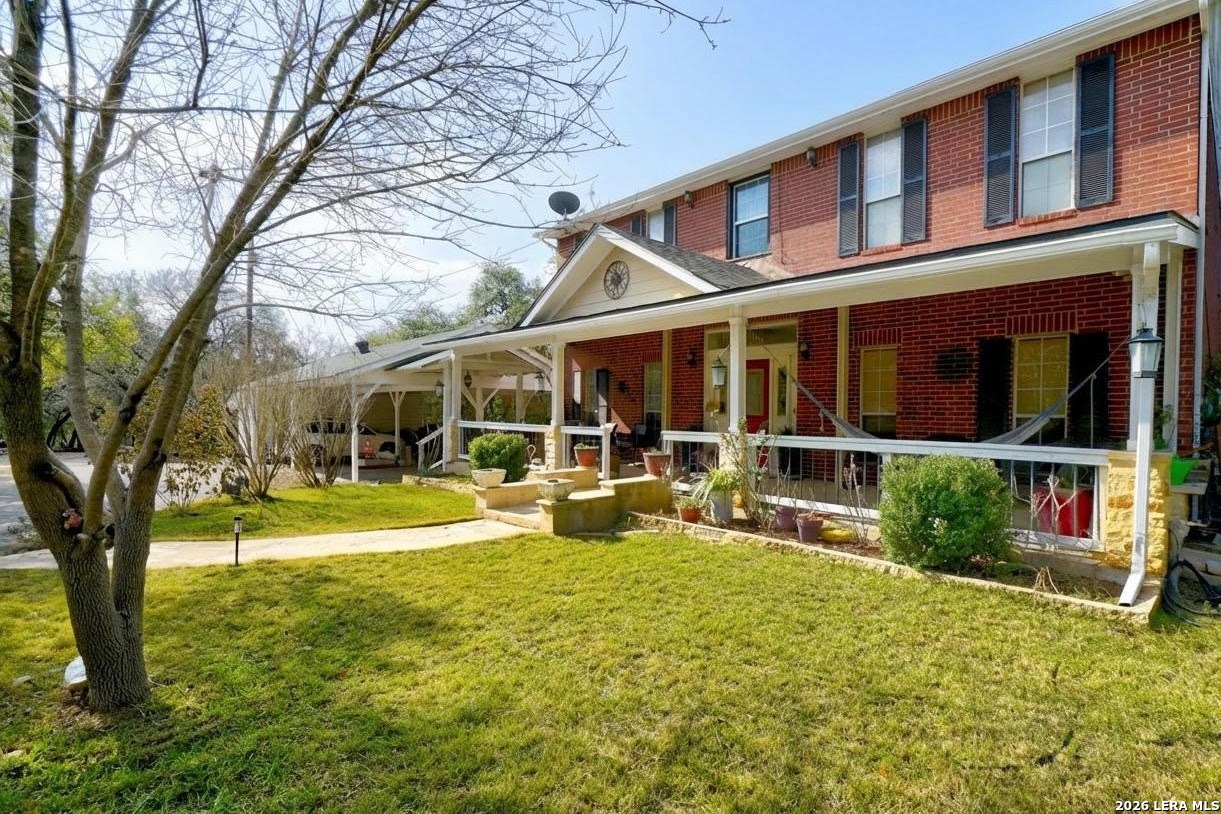 309 South Rolling Oaks Lane San Antonio, TX 78253 - Photo 3 of 43 a view of house with yard and sitting area