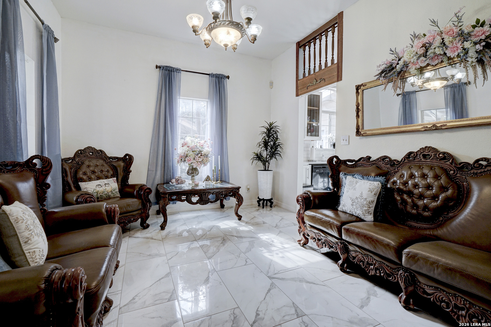 309 South Rolling Oaks Lane San Antonio, TX 78253 - Photo 8 of 43 a living room with furniture chandelier and a window