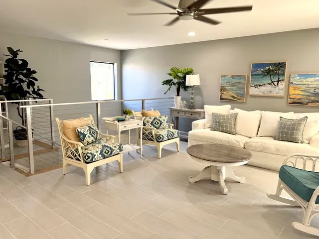 a living room with furniture and a table