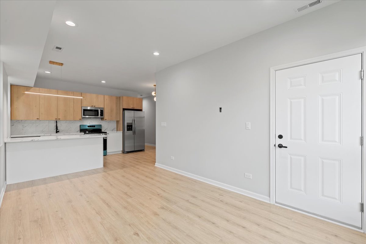 4537 South Evans Avenue, Unit 2 Chicago, IL 60653 - Photo 2 of 12 a view of kitchen with wooden floor