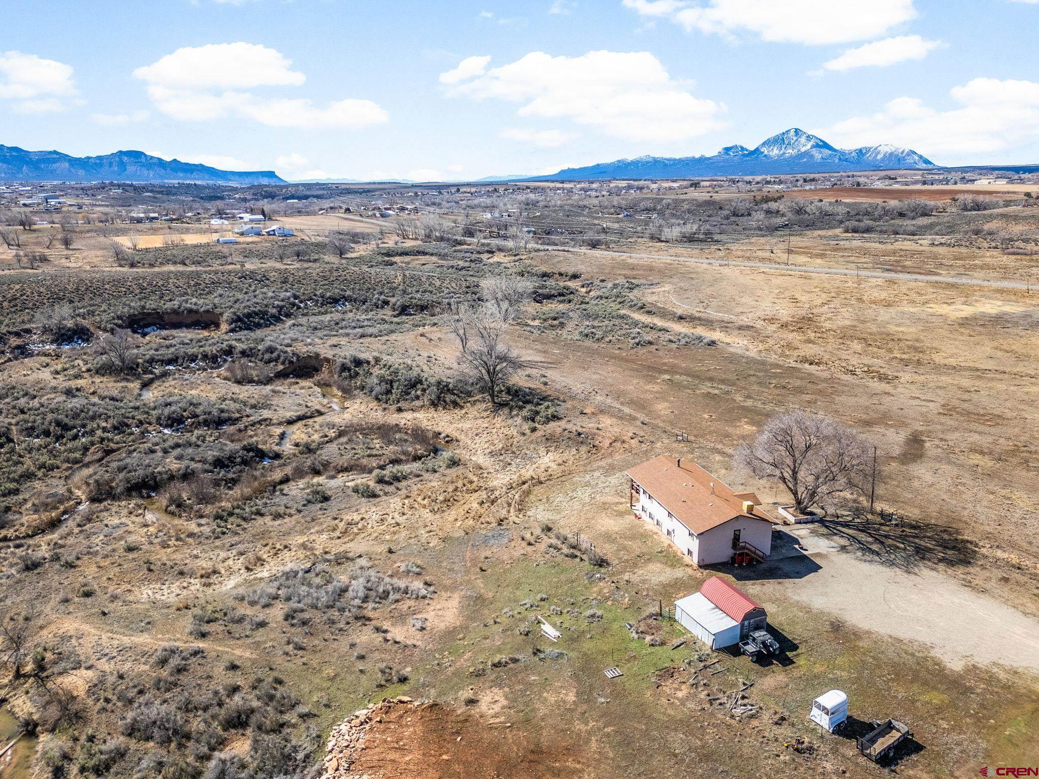 25220 County Rd M Cortez, CO 81321 - Photo 15 of 45 a view of a lake with beach and ocean