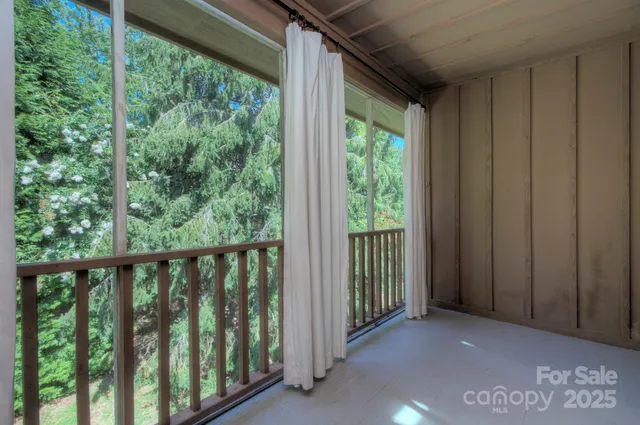 a view of a porch with a yard
