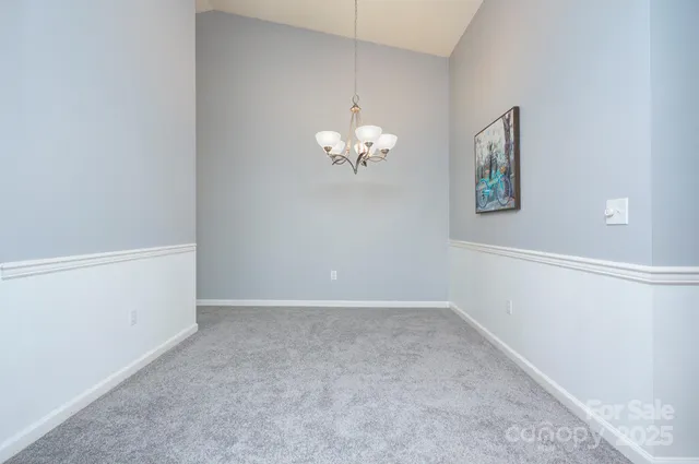 a view of a chandelier in big room