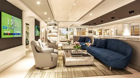 a living room filled with furniture and a floor to ceiling window