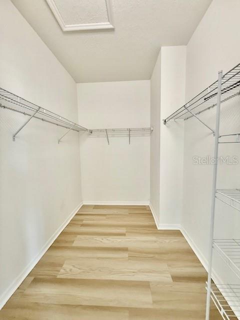 11790 Fennemore Way Parrish, FL 34219 - Photo 14 of 25 a view of a room with racks on the wall