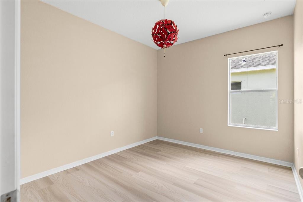 11790 Fennemore Way Parrish, FL 34219 - Photo 15 of 25 an empty room with a window