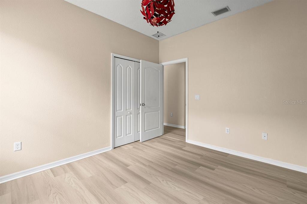 11790 Fennemore Way Parrish, FL 34219 - Photo 16 of 25 a view of an empty room with a window