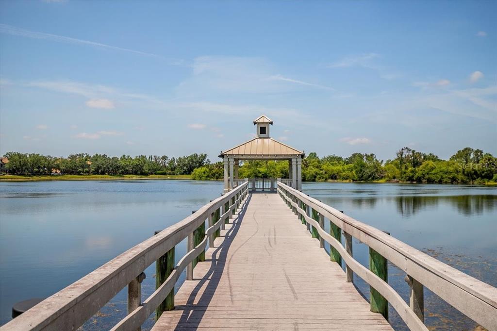 11790 Fennemore Way Parrish, FL 34219 - Photo 25 of 25 a view of wooden floor and a lake view