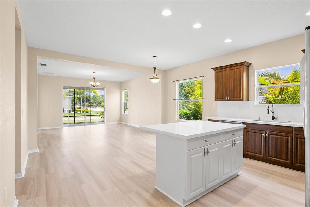 11790 Fennemore Way Parrish, FL 34219 - Photo 6 of 25 a view of a kitchen with a sink and a window