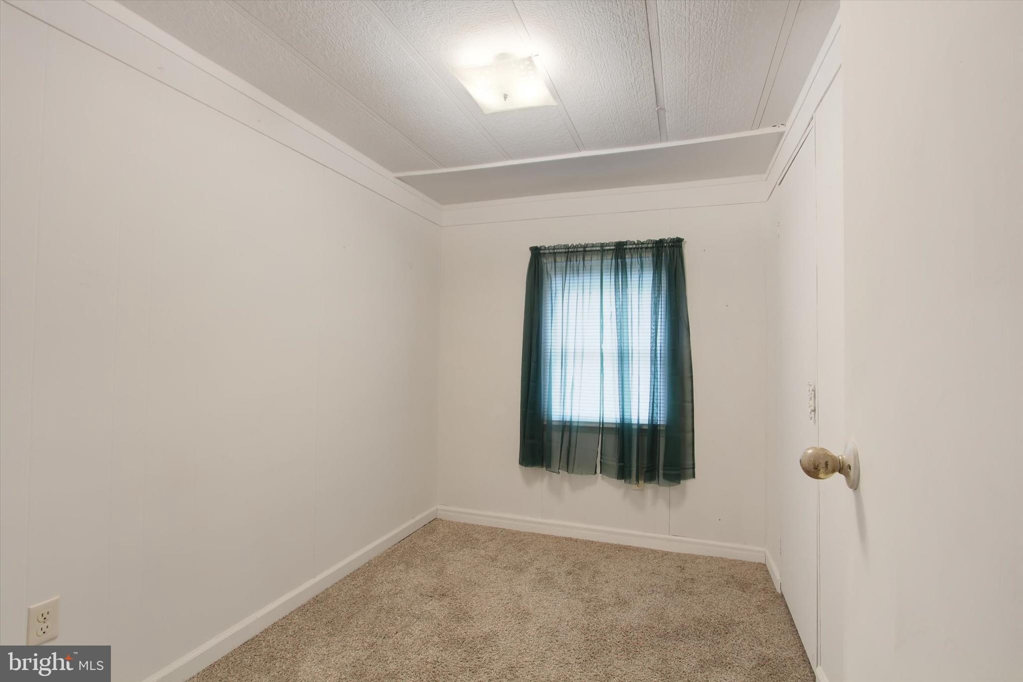 3631 Fairfield Road, Unit (8 837 ACRES) Gettysburg, PA 17325 - Photo 22 of 24 an empty room with a window