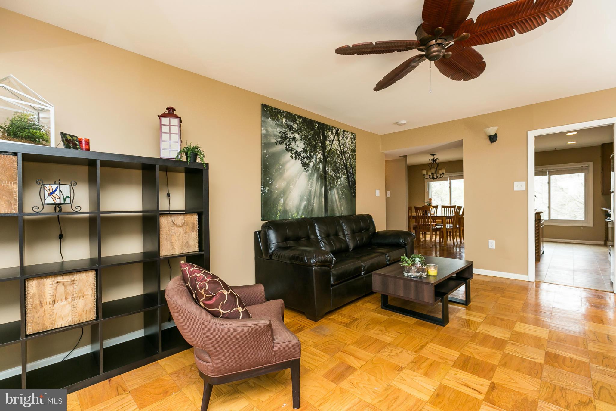 5235 West Running Brook Road, Unit 302 Columbia, MD 21044 - Photo 12 of 29 a living room with furniture