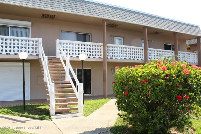 a kitchen with a refrigerator a stove a microwave and sink