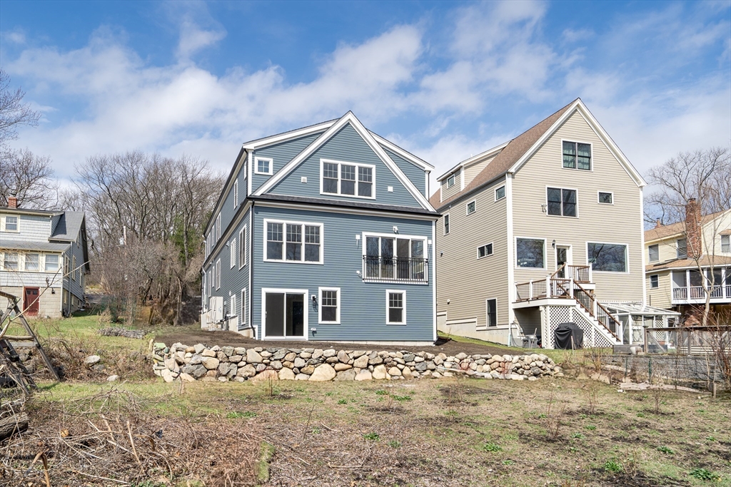 232 Lincoln Street Lexington, MA 02421 - Photo 41 of 41 a front view of a house with a yard