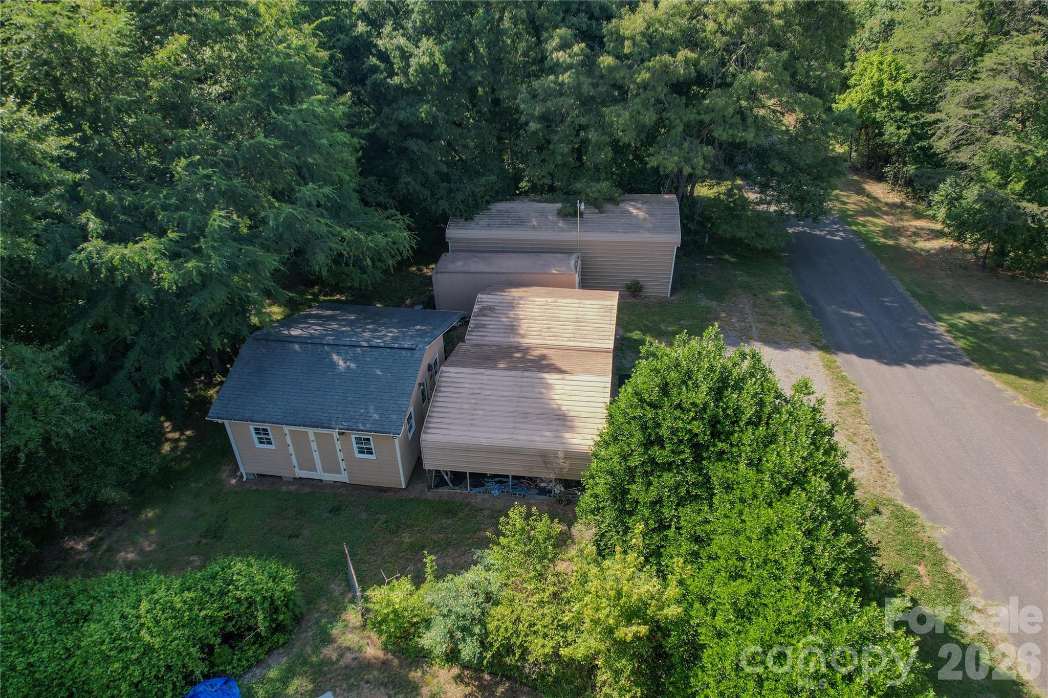 204 Old Stage Coach Road Lawndale, NC 28090 - Photo 5 of 30 an aerial view of a house with garden space sitting space and garden view