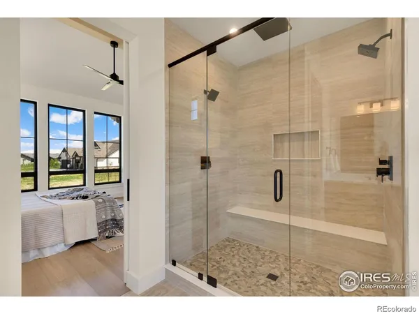 a kitchen with stainless steel appliances kitchen island granite countertop a stove and cabinets