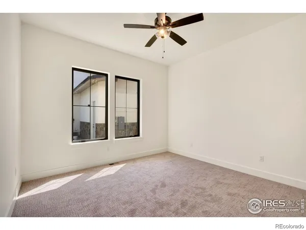 a view of bathroom with bathtub and wooden floor
