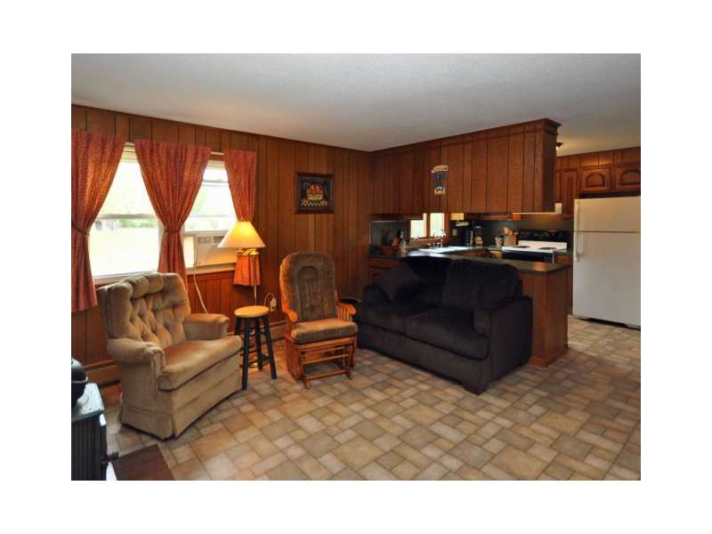 28 Greenhouse Road Coventry, RI 02827 - Photo 3 of 11 Den/Family/Great Room. Comfortable den with wood stove