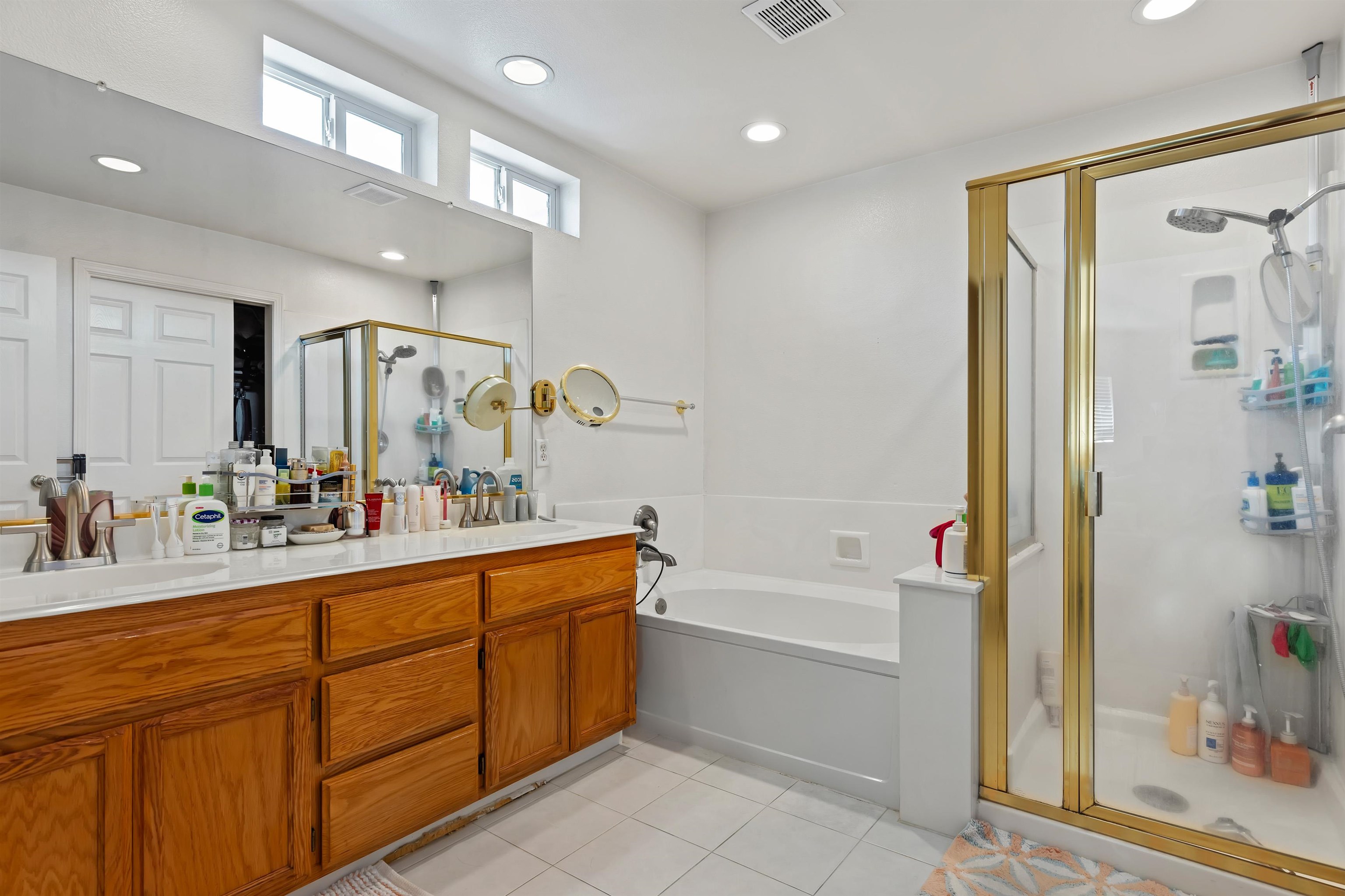 3567 Dayton Common Fremont, CA 94538 - Photo 19 of 29 a bathroom with a tub sink and mirror