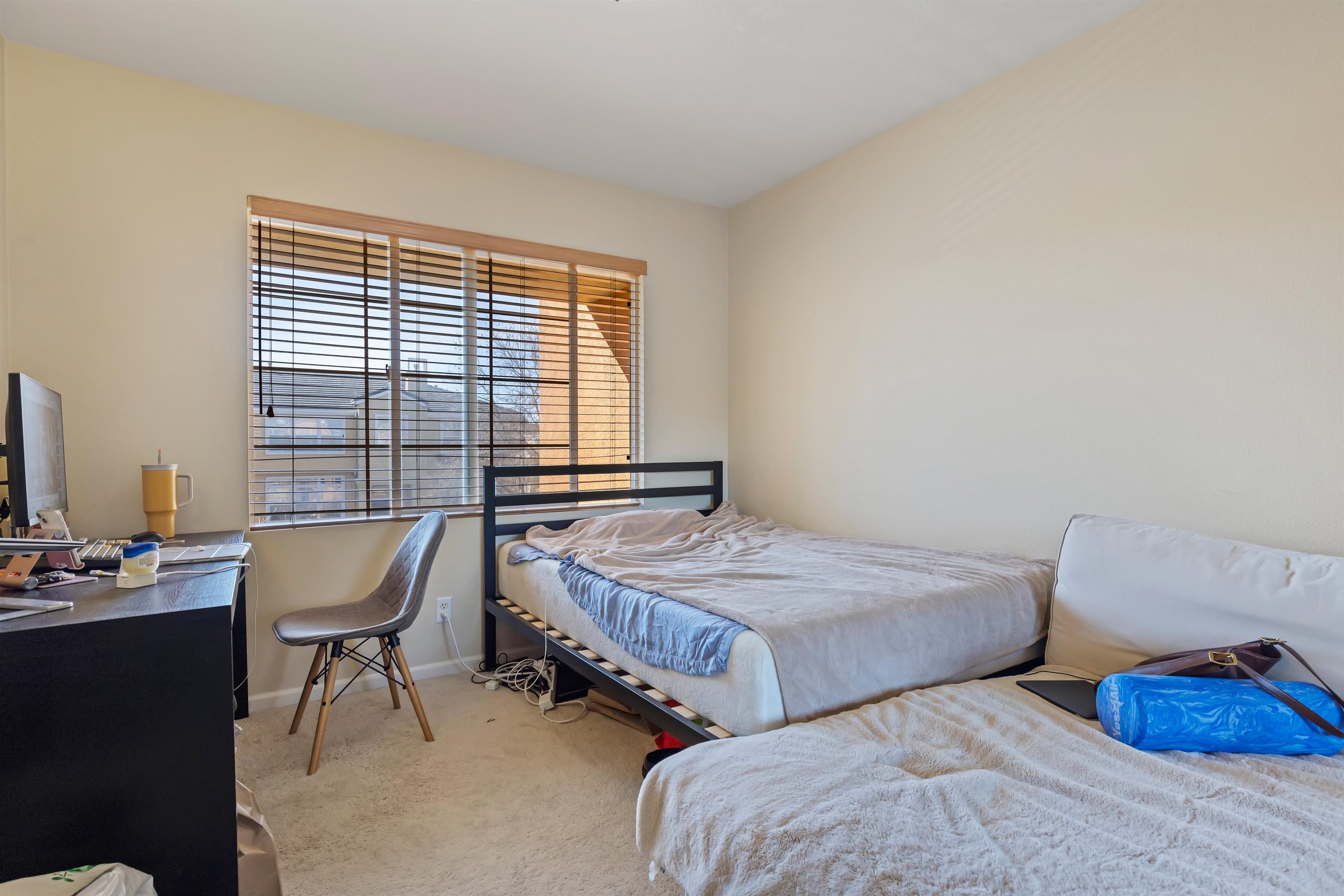 3567 Dayton Common Fremont, CA 94538 - Photo 20 of 29 a bedroom with two beds and a chair