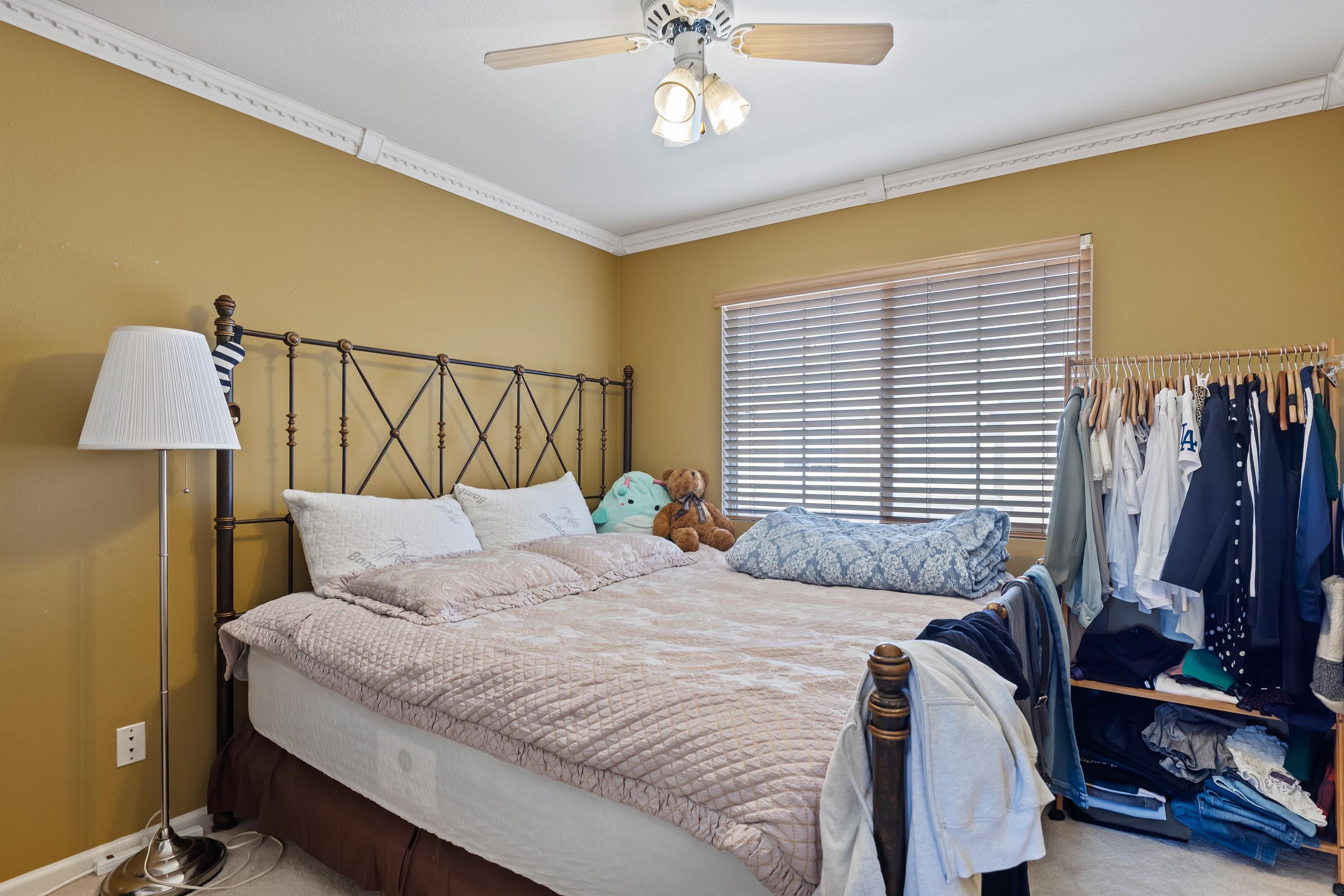 3567 Dayton Common Fremont, CA 94538 - Photo 21 of 29 a bedroom with a bed a couch and a window