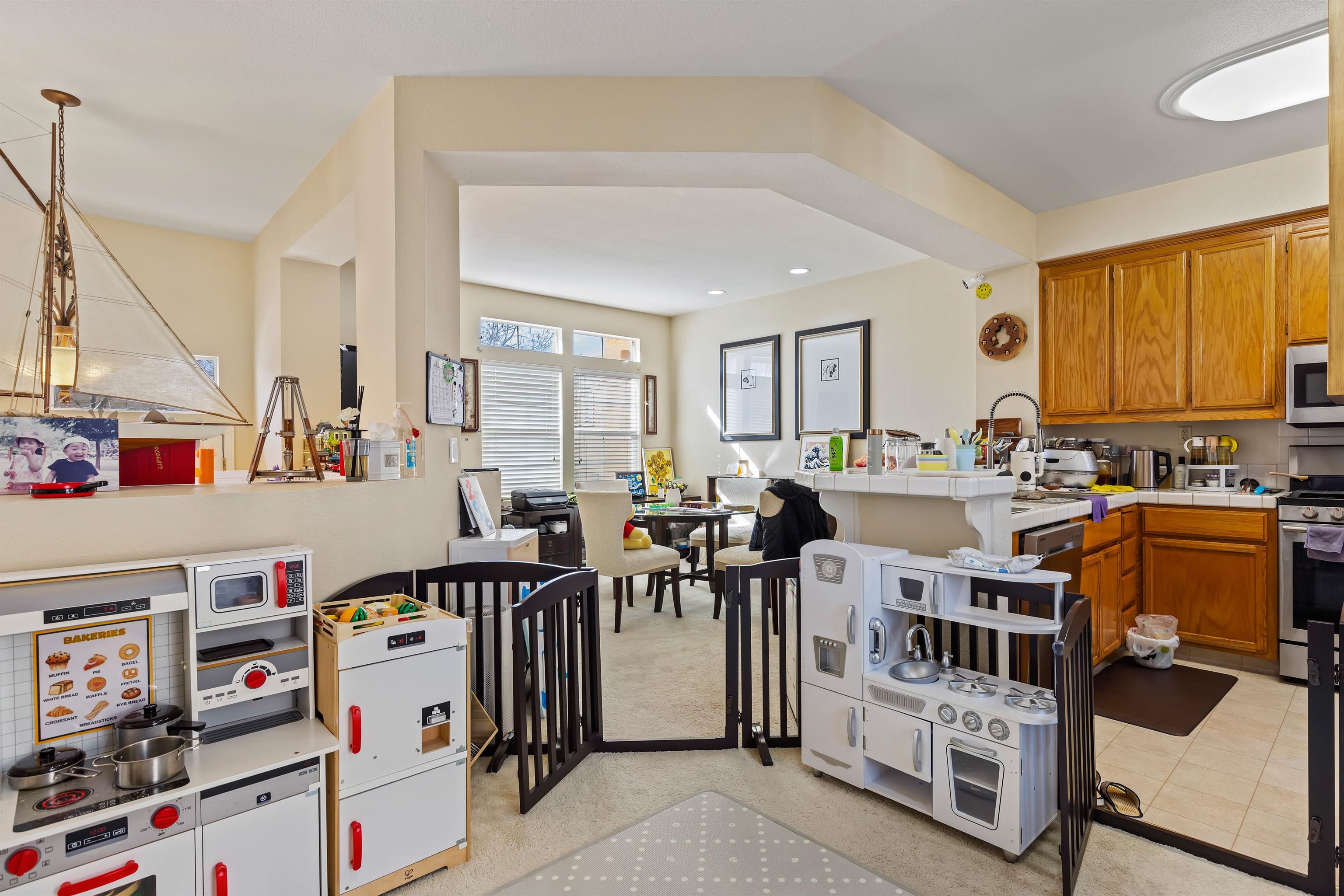 3567 Dayton Common Fremont, CA 94538 - Photo 8 of 29 a living room with furniture and a dining table