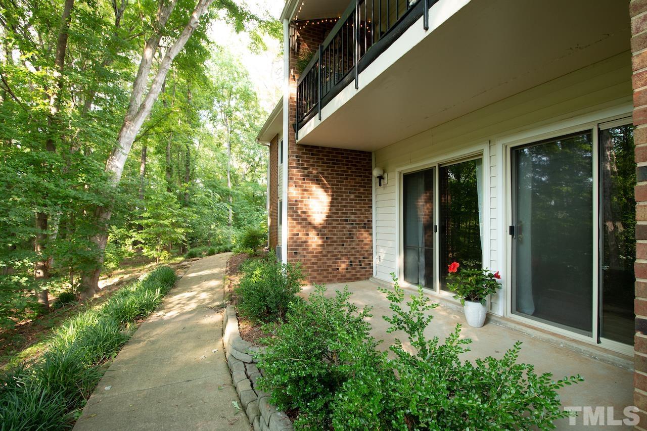 4711 Edwards Mill Road, Unit C Raleigh, NC 27612 - Photo 11 of 13 front view of a house with a yard