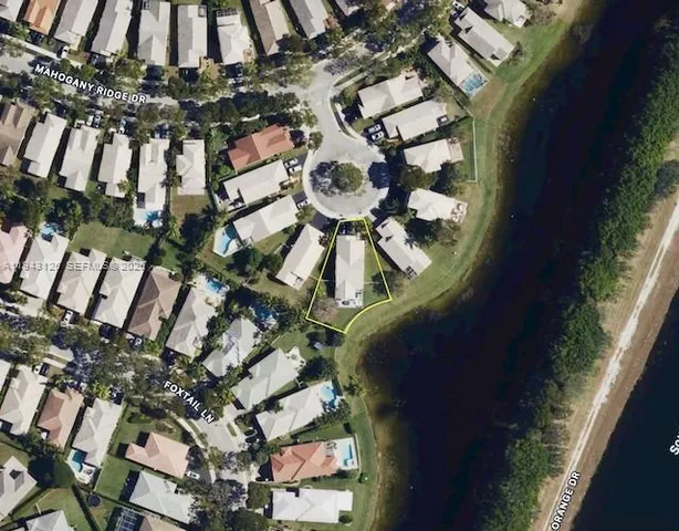 a view of a patio with chairs and tables