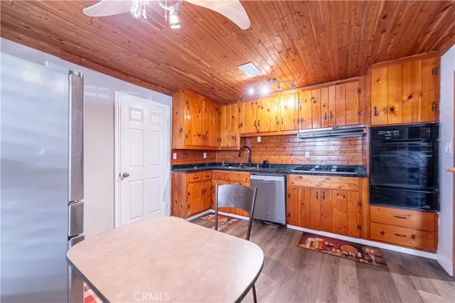 a bedroom with a bed and a chair