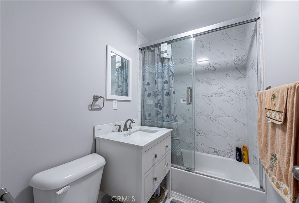 4759 Cochran Street Simi Valley, CA 93063 - Photo 17 of 71 a bathroom with a sink toilet and shower