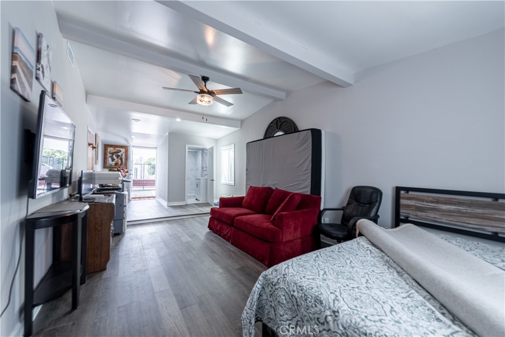 4759 Cochran Street Simi Valley, CA 93063 - Photo 20 of 71 a living room with furniture and wooden floor