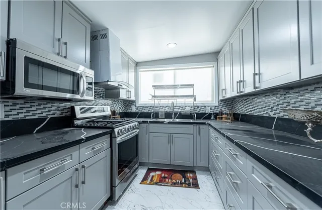 a view of a swimming pool with a deck