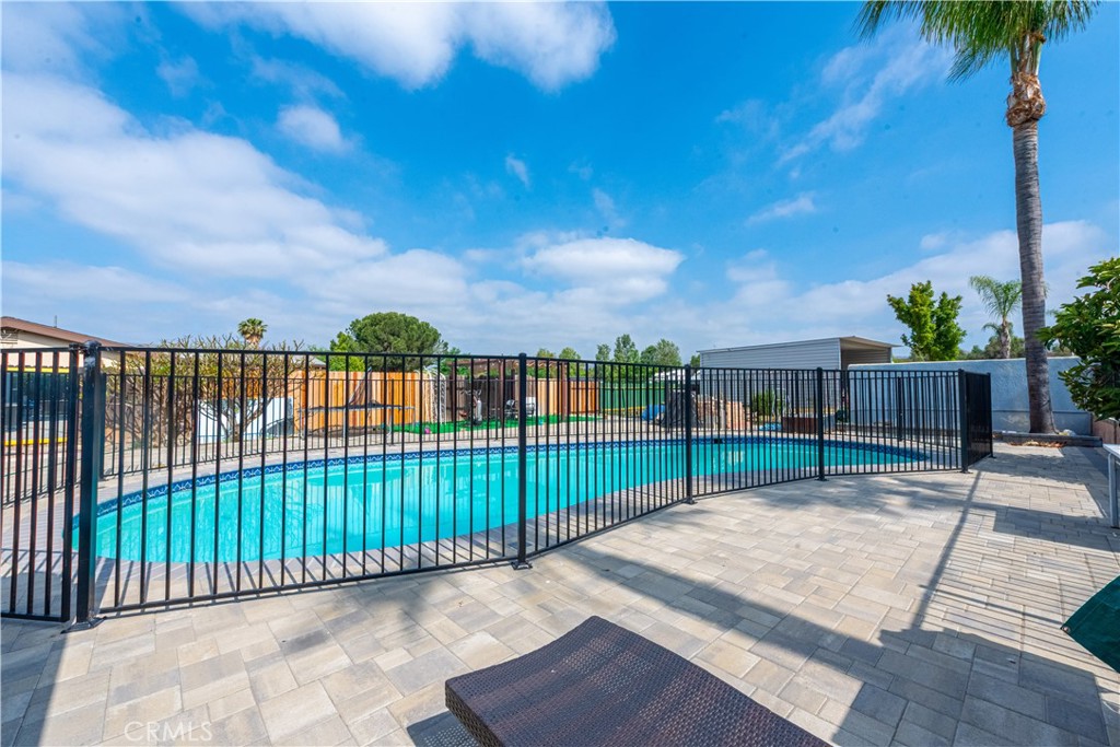 4759 Cochran Street Simi Valley, CA 93063 - Photo 28 of 71 a view of a backyard with wooden fence