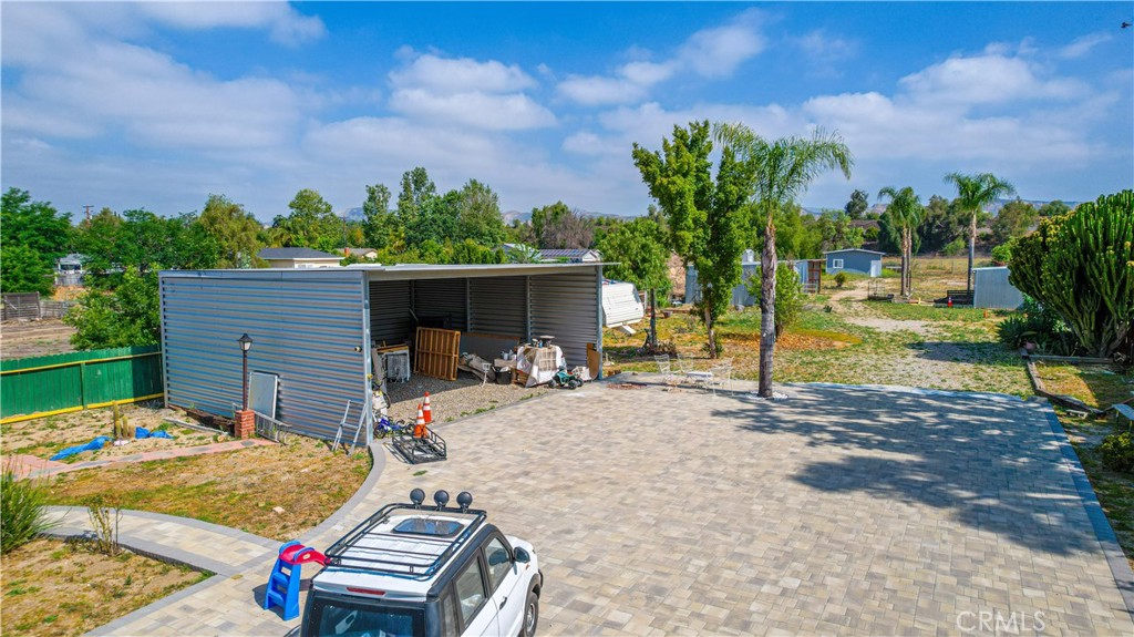 4759 Cochran Street Simi Valley, CA 93063 - Photo 40 of 71 a backyard of a house with table and chairs
