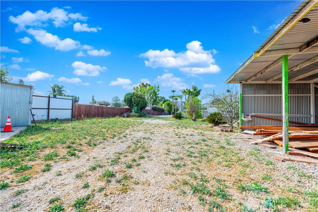 4759 Cochran Street Simi Valley, CA 93063 - Photo 45 of 71 a backyard of a house with garden and barbeque oven