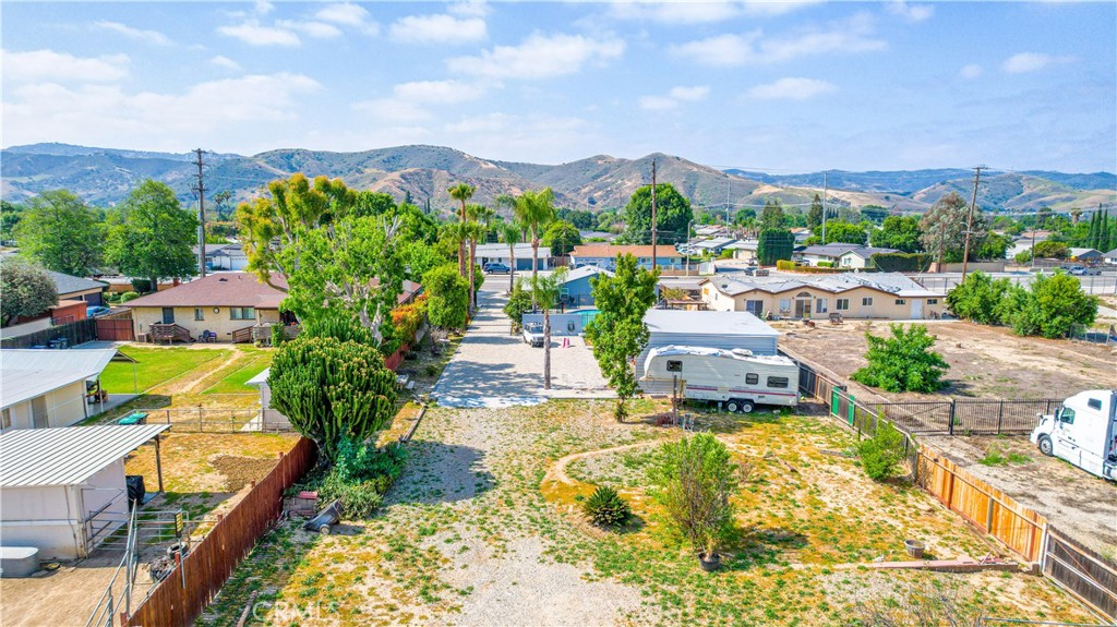 4759 Cochran Street Simi Valley, CA 93063 - Photo 46 of 71 an aerial view of a swimming pool with a yard