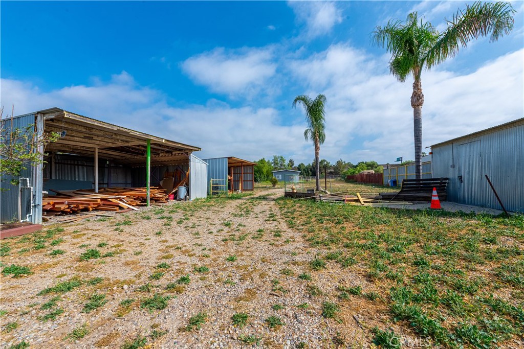 4759 Cochran Street Simi Valley, CA 93063 - Photo 47 of 71 a view of a house with backyard and a tree